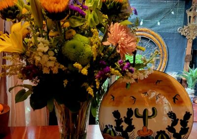 a gift of flowers and a decorated plate from my friend Mrs. Maureen M.