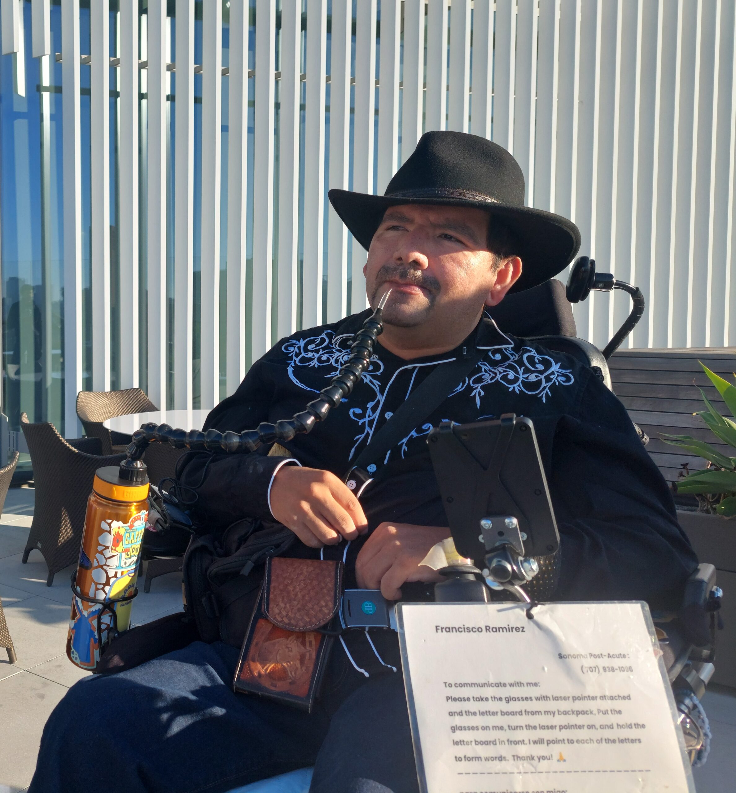 Pancho Ramirez wearing a black cowboy outfit with a black hat